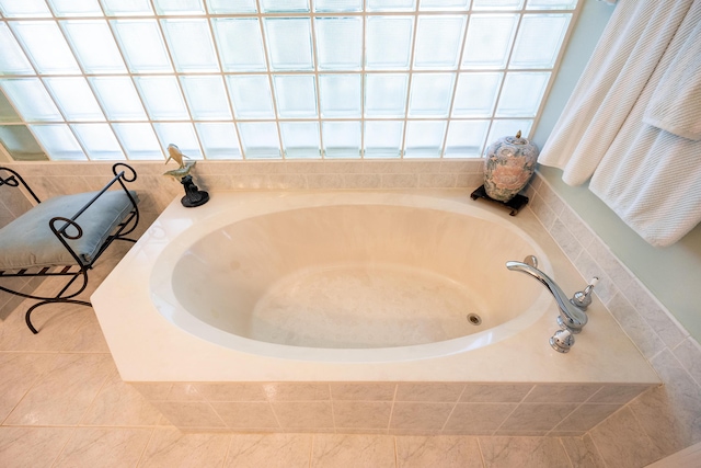 bathroom featuring a tub to relax in