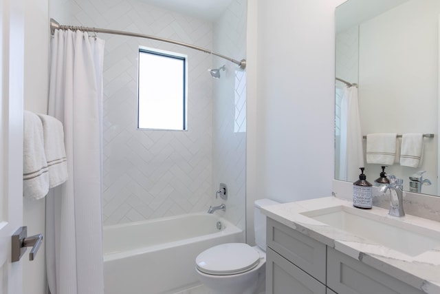 full bathroom with shower / bath combination with curtain, vanity, and toilet