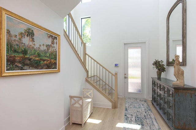 entryway with light hardwood / wood-style flooring