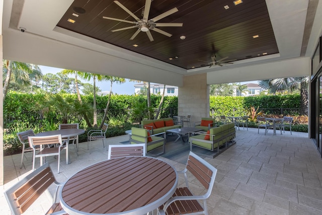 view of patio featuring an outdoor hangout area and ceiling fan