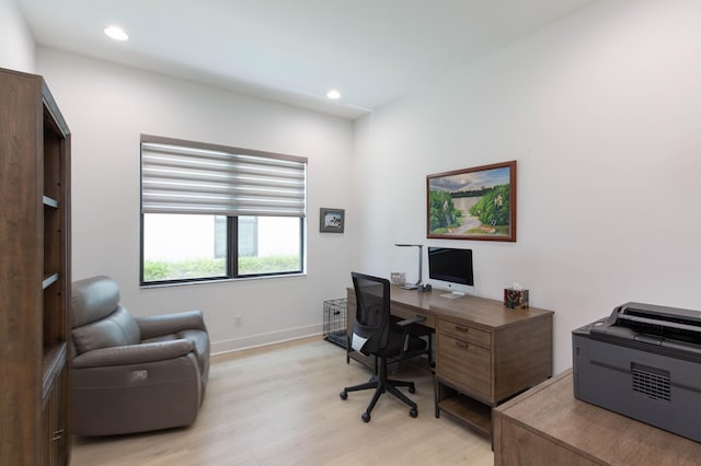 office area with light wood-type flooring