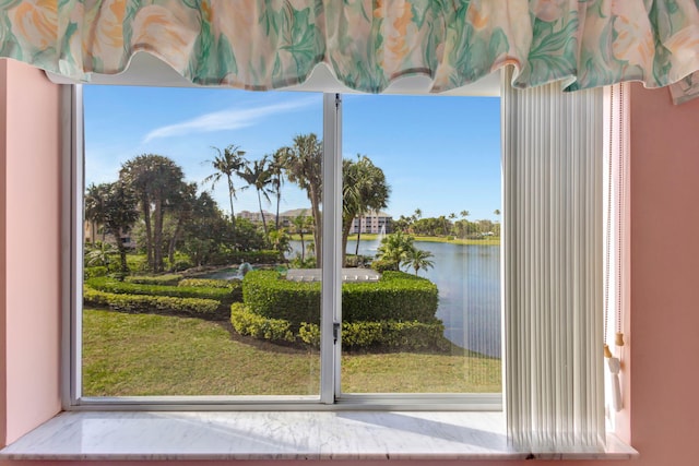 entryway featuring a water view