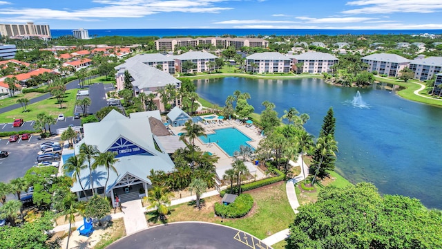 bird's eye view with a water view