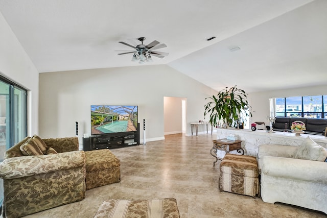 living room featuring ceiling fan and lofted ceiling