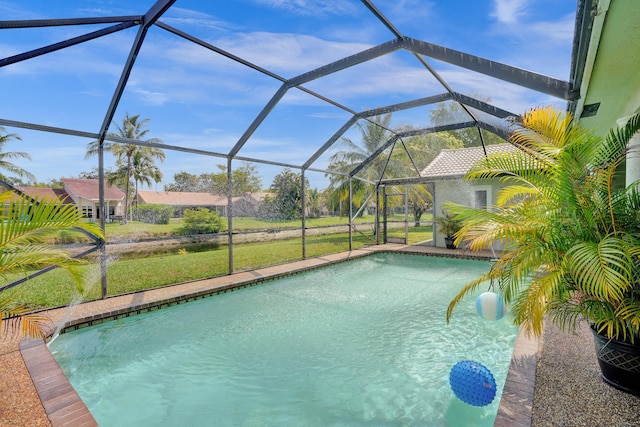 view of pool with a lanai