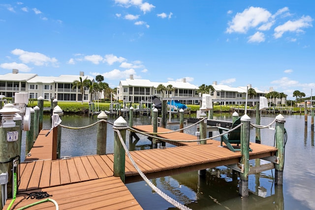 view of dock with a water view