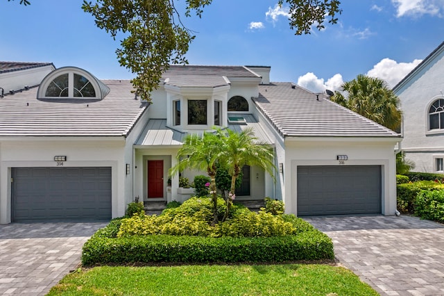 view of front of house with a garage