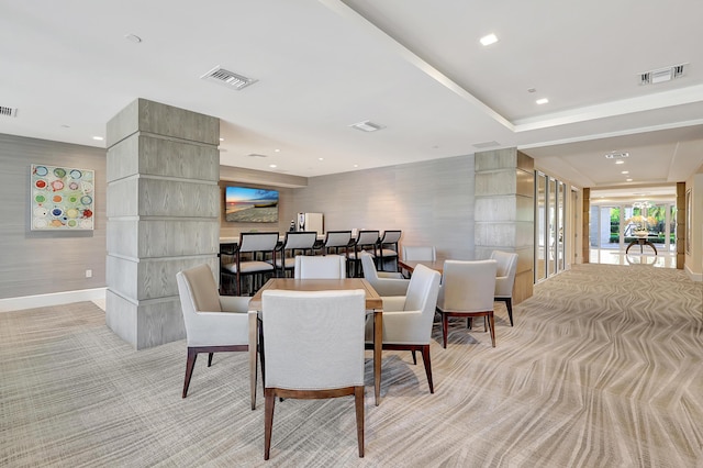 view of carpeted dining area