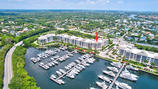 birds eye view of property featuring a water view