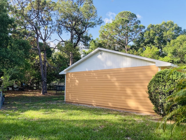 view of property exterior with a lawn