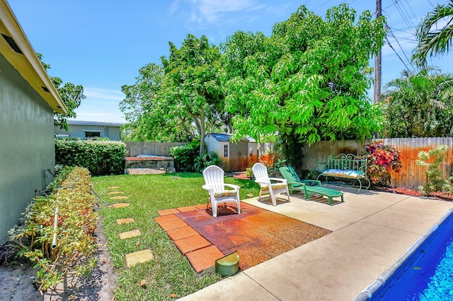 view of patio with a fenced in pool