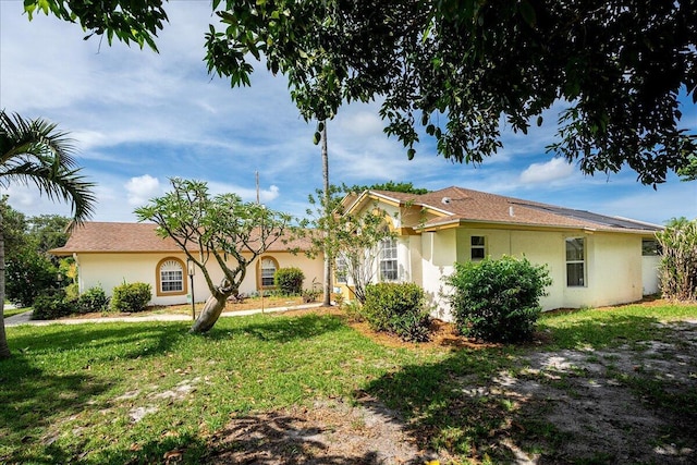 exterior space with a front yard