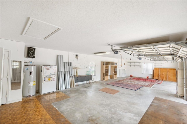 garage with white refrigerator, a garage door opener, and water heater