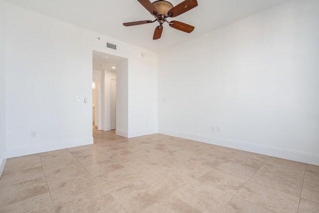 unfurnished room featuring ceiling fan