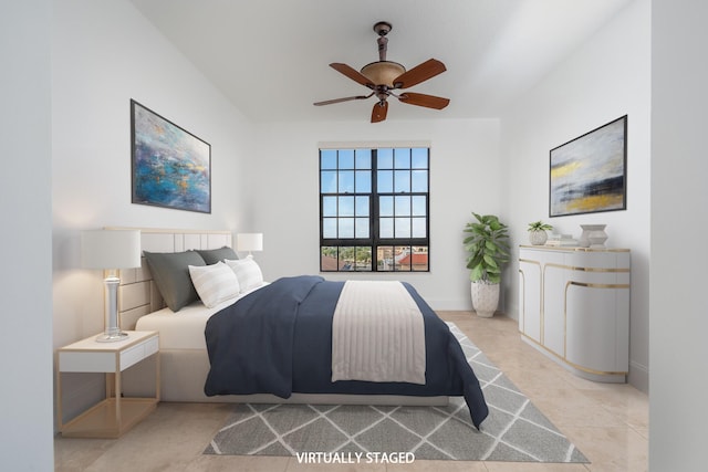 bedroom featuring ceiling fan and light tile patterned floors