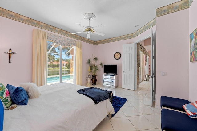 tiled bedroom with access to outside and ceiling fan