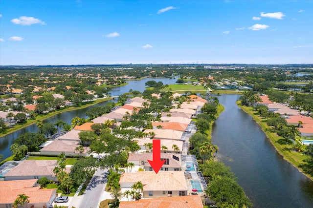 drone / aerial view with a water view