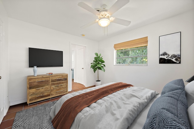 tiled bedroom with ceiling fan