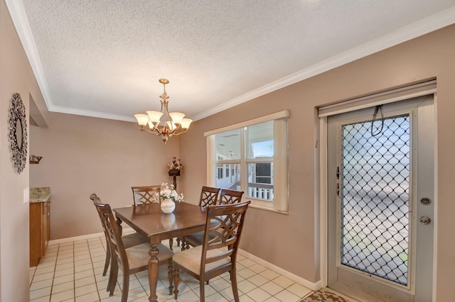 tiled dining space featuring a notable chandelier, ornamental molding, and a textured ceiling