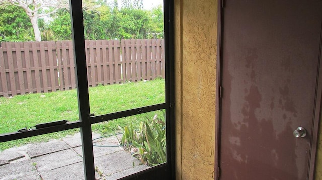 doorway to outside featuring a wealth of natural light