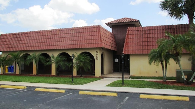 view of property featuring cooling unit