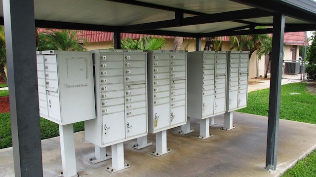 view of home's community with a mail area