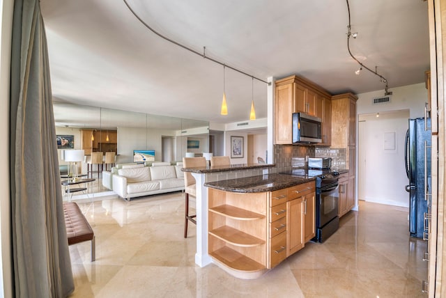 kitchen featuring backsplash, dark stone counters, black appliances, a kitchen breakfast bar, and kitchen peninsula