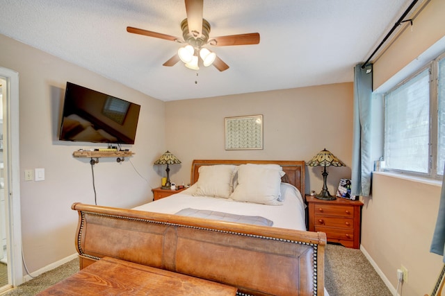 bedroom featuring carpet flooring and ceiling fan