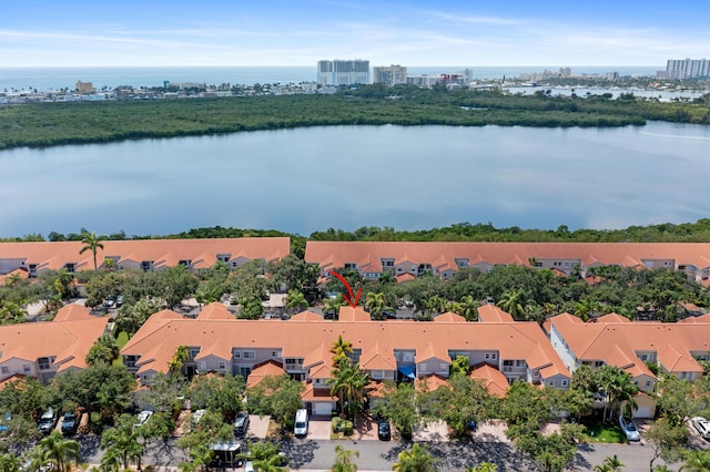 birds eye view of property featuring a water view