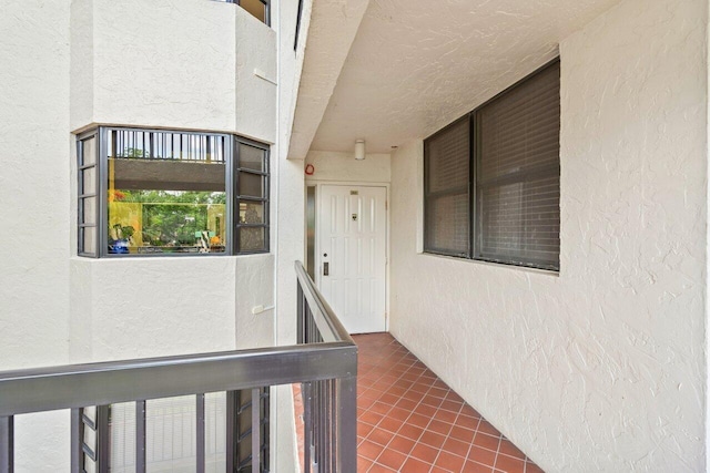 property entrance with a balcony