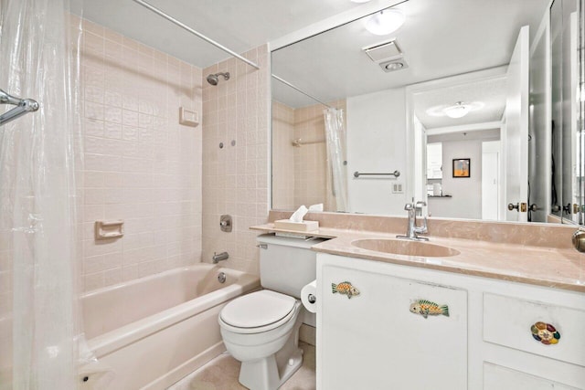 full bathroom with tile floors, oversized vanity, toilet, and shower / tub combo