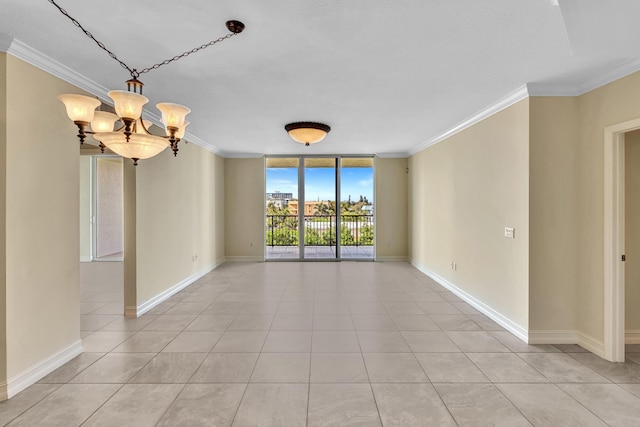 tiled spare room with floor to ceiling windows, crown molding, and a notable chandelier