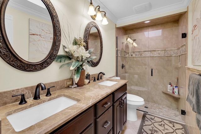 bathroom featuring tile patterned flooring, toilet, a shower with door, and crown molding