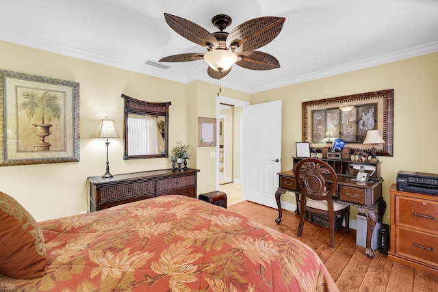 bedroom with ceiling fan, light hardwood / wood-style flooring, and crown molding