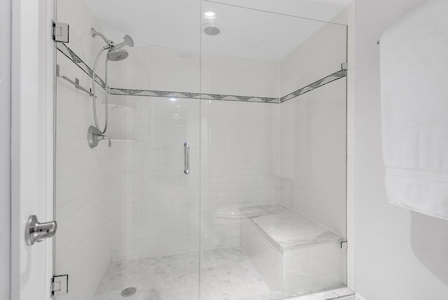 bathroom featuring walk in shower