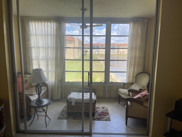 sitting room featuring tile flooring