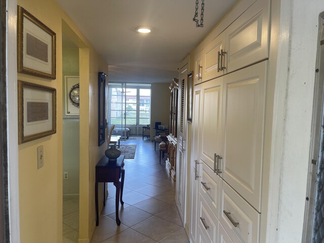 hallway with light tile floors