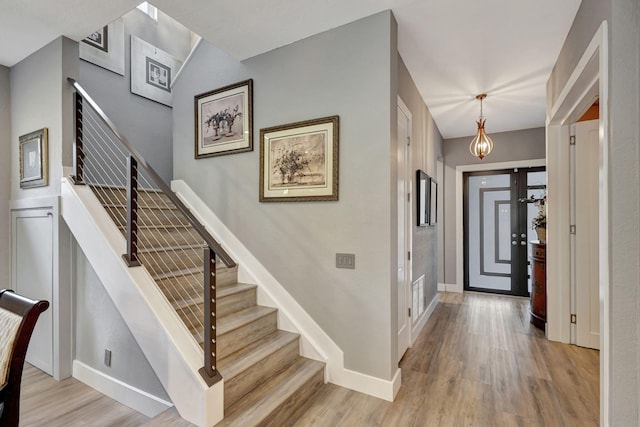 entrance foyer with light hardwood / wood-style flooring