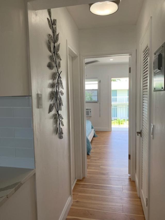 hallway featuring hardwood / wood-style floors