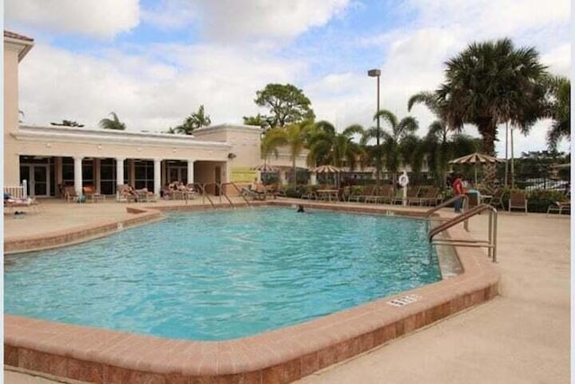 pool featuring a patio