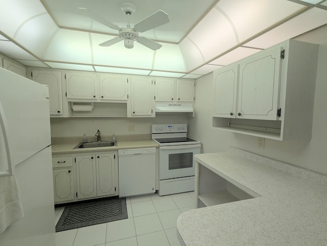 kitchen with white appliances, ceiling fan, sink, white cabinets, and light tile patterned flooring