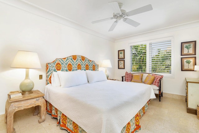 bedroom featuring ceiling fan and crown molding