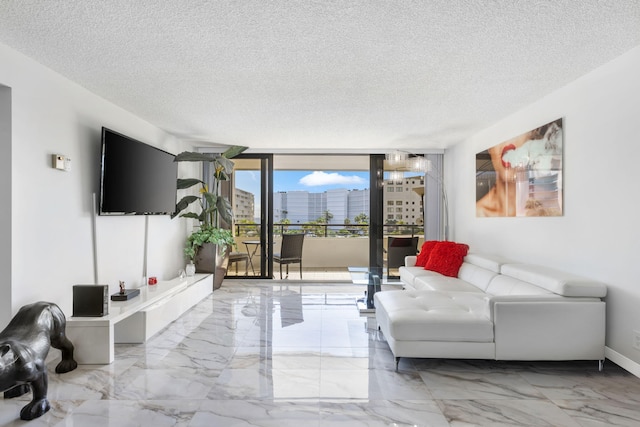 tiled living room with a textured ceiling and floor to ceiling windows