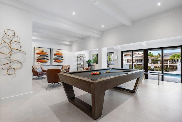 game room with beamed ceiling, a healthy amount of sunlight, light tile floors, and pool table