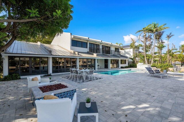 view of swimming pool featuring a patio