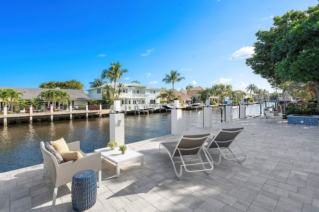 dock area with a water view