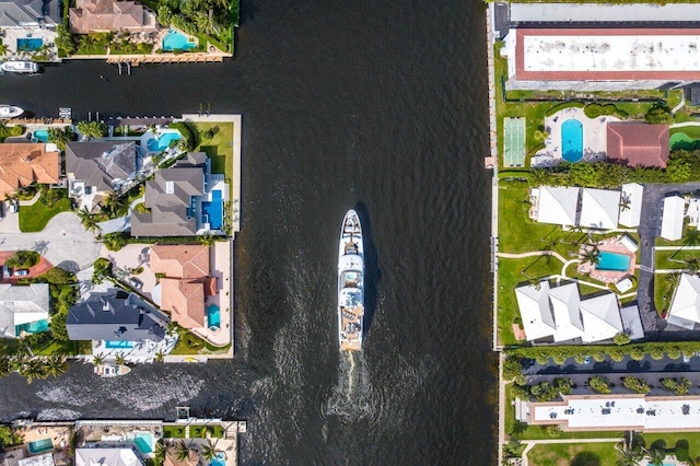 bird's eye view with a water view