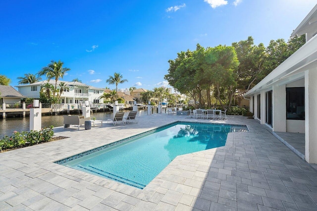 view of swimming pool featuring a patio