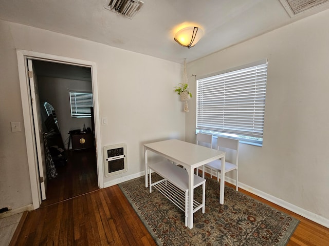 dining room featuring wood-type flooring