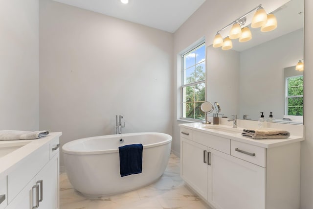 bathroom featuring a bathtub and vanity